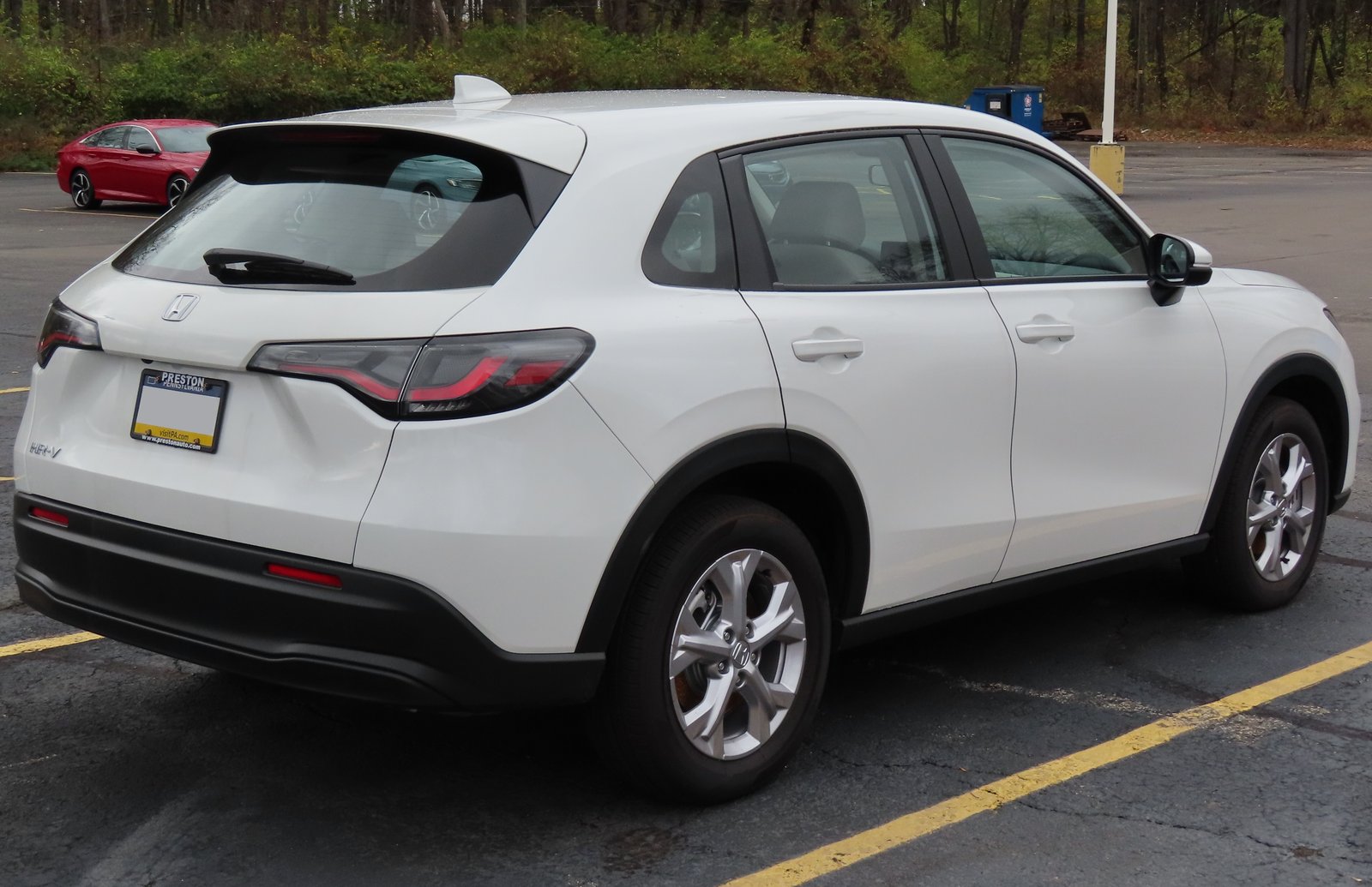 2023 Honda HR-V LX in white, rear three-quarter view