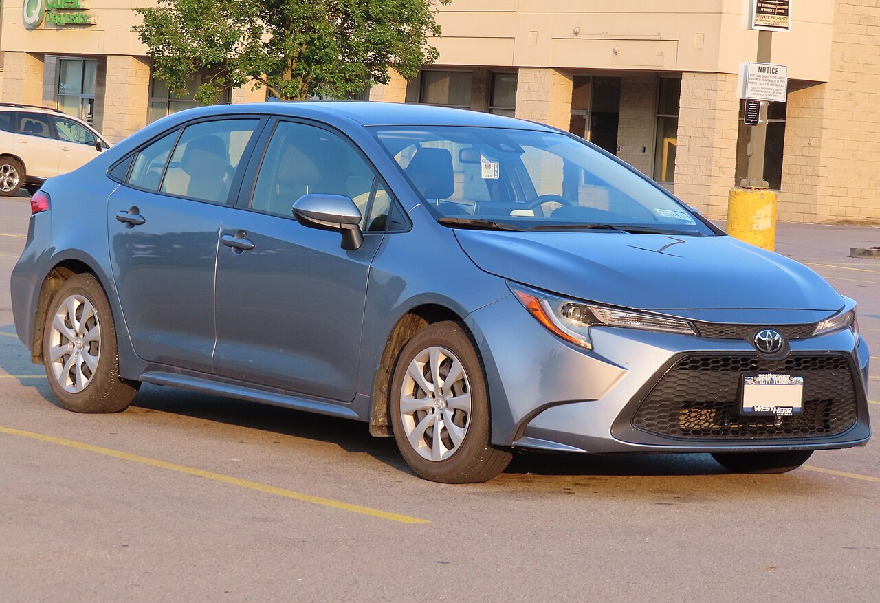 2021 Toyota Corolla LE sedan, front three-quarter view